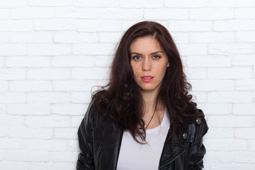 Fashion Woman Black Leather Jacket Beautiful Brunette Girl Over White Brick Wall Background