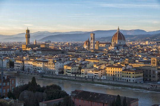 Italy, Florence, cityscape with Palazzo Vecchio and Basilica di Santa Maria del Fiore at sunset