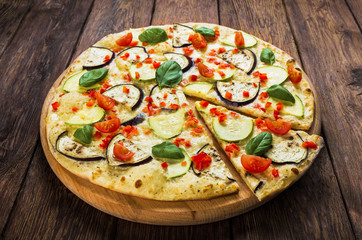 Vegetarian pizza with aubergines and zucchini