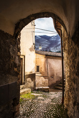 glimpse of Villalago through old arch