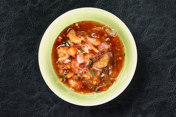 Sweet fish sauce ready to serve on green bowl represent represent Thai’s cuisine and diet meal with real Thai traditional food.