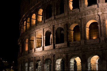 Roman Coliseum at night in Rome, Italy