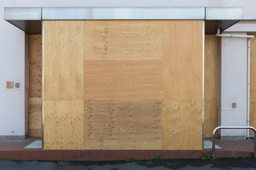 Large blank billboard on a street wall, banners with room to add your own text