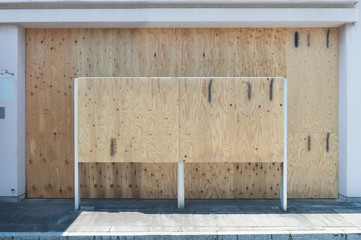 Large blank billboard on a street wall, banners with room to add your own text