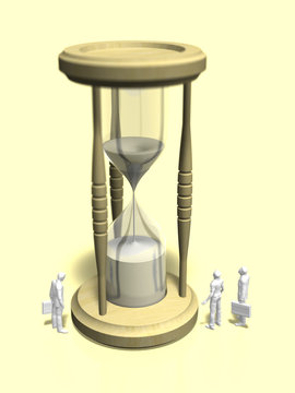 Business figures looking at the hourglass
