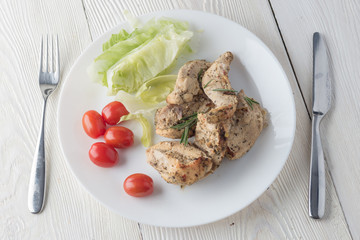 Grilled chicken breast with fresh vegetables
