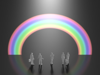 Business figures looking at the rainbow