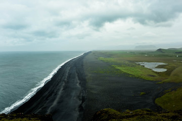 Black beach in Iceland. Dyrhalaey.