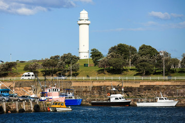 Belmore Basin, Wollongong Harbour, a still marina under Wollongong Head Lighthouse