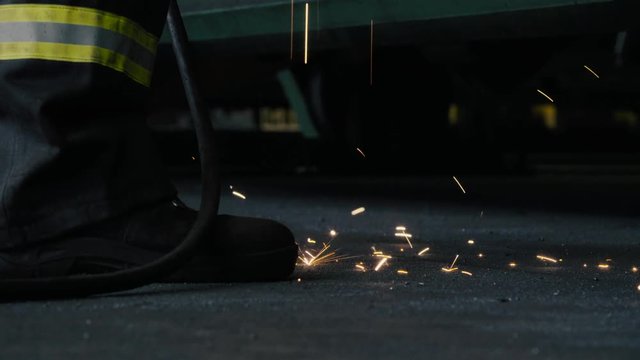 Sparks of welding falling on the floor