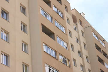 Facade of beautiful multi-storey modern building with windows