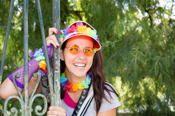 girls laughing dressed all in fluorescent color with her pink glasses