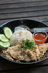 fried pork with fried rice and garlic
