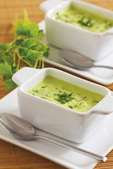 Homemade green sauce in rectangular bowls.