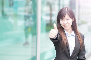 businesswoman thumb up