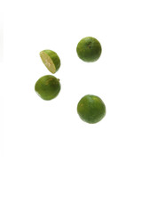 fresh green lime over white background