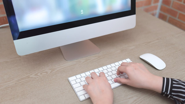 Typing on Mac keyboard.