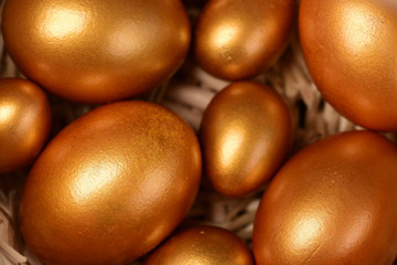 traditional golden eggs, happy easter holiday celebration