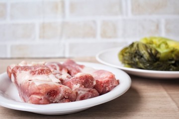 Pickled mustard green with pork rips