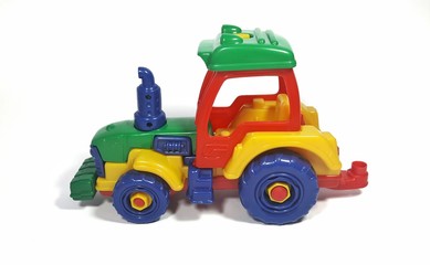 Toy tractor isolated on white background