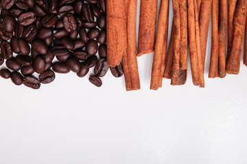 Coffee beans and cinnamon sticks.