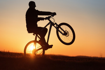 Fototapeta na wymiar silhouette of biker