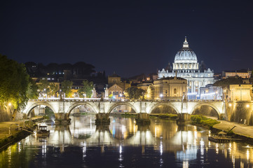 Obraz na płótnie Canvas Vatican City, Rome, Italy, Beautiful Vibrant Night image Panorama of St. Peter's Basilica, Ponte St. Angelo and Tiber River