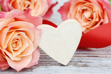 roses with white heart on wood