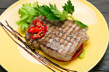Restaurant food on wooden table. Perfect beef steak