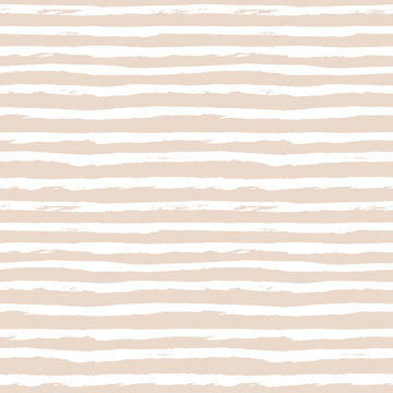 Seamless pattern with horizontal hand drawn stripes, lines. Abstract pastel cute background in naive scandinavian style. White and beige, or light peach, colors. Vector illustration.