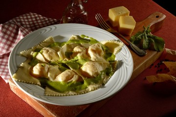 Panzoti stuffed with pear and brie with arugula cream