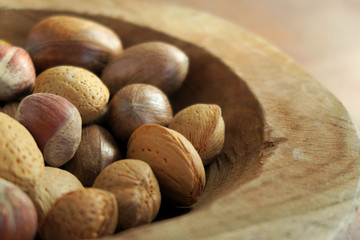 Nuts in wooden bowl.