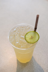 lime juice in plastic cup