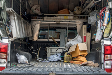 The cargo space of lorry with tools. Equipment craftsman in a pickup. Car with tools for repair and...