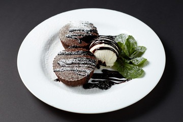 Chocolate fondant with ice cream. Dessert.