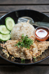 fried pork with fried rice and garlic
