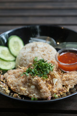fried pork with fried rice and garlic