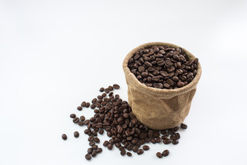 Coffee beans and coffee bags, isolated on white background