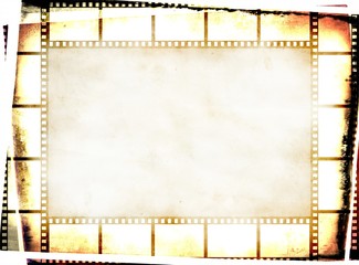 Vintage film strip frame on damaged paper in sepia tones.