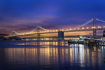 The Bay Bridge in San Francisco Bay at night