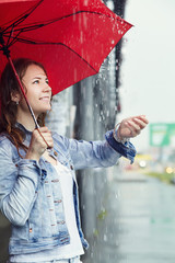 wet young girl in the rain
