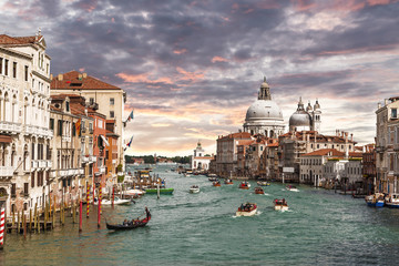 Fototapeta na wymiar The Grand canal with views of the Cathedral Santa Maria della Salute, Italy