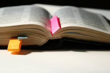 The open Bible on the table