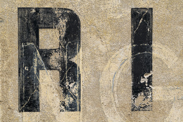 vintage letters on a wall for backgrounds