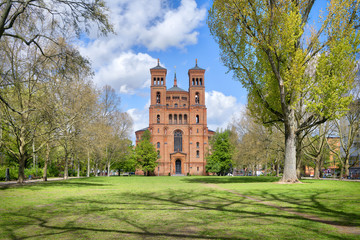 Fototapeta premium red brick church in spring, Berlin Kreuzberg