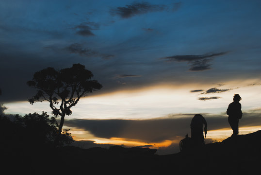 Men silhouette at sunset in Brazil