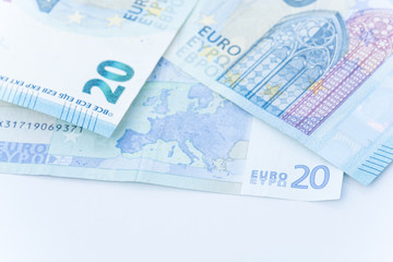 Close-up of Euro money - 20 euro banknotes on white background.