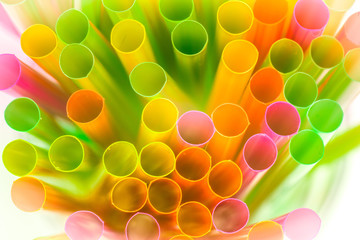 Macro view of multi coloured drinking straws