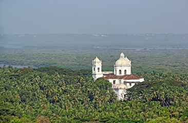 Fototapeta premium The Church of St. Cajetan viewed form Monte Hill in Old Goa, India. A 17 th century church in Corinthian style that mimic St. Peter’s Basilica in Rome and crowned with a big hemispherical dome