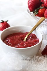 Homemade Strawberry Sauce served in a bowl, selective focus